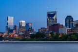 Fototapeta  - Skyscrapers Cityscape Downtown, Nashville Skyline Buildings. Beautiful Real Estate. Night time. Empty rooftop View. Success concept.