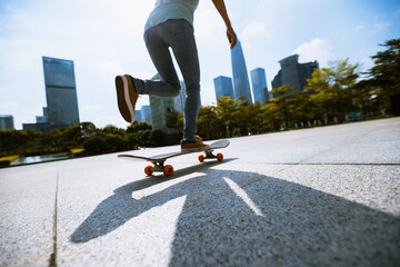 Wall Mural - Skateboarder skateboarding outdoors in city