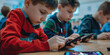 Child son student student bad behavior boy schoolboy playing a video game on a mobile phone during a lesson at school hide the smartphone