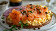 Smoked salmon on scrambled eggs and toast