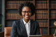 college student in library, african american professional woman with glasses in library 