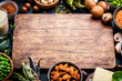 Vegan food background with copy space wooden cutting board. Plant protein., vegetarian nutrition sources. Healthy eating, diet ingredients: legumes, beans, lentils, nuts, soy milk, tofu, cereals