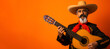 Mexican senior man in sombrero hat playing guitar on orange background, Cinco de Mayo
