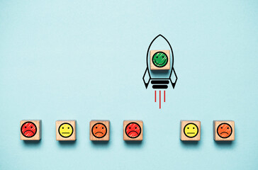 Poster - Smile face icon inside rocket missile rising from sad face icon for customer excellent experience evaluation feedback and survey after use product and service concept.