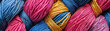 A bunch of colorful yarns are tied together