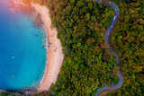Fototapeta  - Aerial top view Phuket, sand beach of paradise sea and winding road, sunset time. Tropical travel photo of Thailand