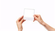 hands holding blank polaroid photo frame template