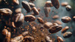 Freeze motion of flying group of cocoa beans. Isolated on black background