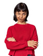 Young Hispanic woman with short black hair in studio unhappy looking in camera with sarcastic expression.