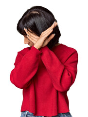 Poster - Young Hispanic woman with short black hair in studio keeping two arms crossed, denial concept.