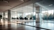 An office space with a glass wall and partition for transparency and modernity