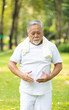 © offsuperphoto - asian senior man workout and practice tai chi in the park