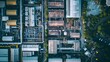 A panoramic aerial view of a sprawling industrial complex, where factories hum with activity and logistics operations seamlessly coordinate the flow of goods