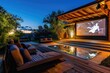 Outdoor home cinema with movie projection at night