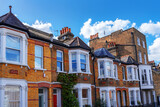 Fototapeta Desenie - Front view of traditional Victorian and Georgian brick houses in Greenwich area in South - East London, United Kingdom