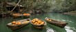  tiny boats laden with oranges gracefully bobbing atop the river, alongside a rustic wooden boat house