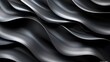   A monochrome image of undulating waves etched onto a black-and-white substrate against a pitch-black backdrop