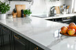 Designer modern bright kitchen in minimalist style. Technological kitchen appliances, electronic stove