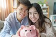 © AI Studio - An Asian couple plans to save money together and uses piggy bank savings management.