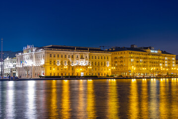 Wall Mural - Night view of Savoia Excelsior Palace in Italian town Trieste