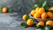 Loquats in a bowl with fresh leaves highlight ripe, vibrant, juicy, and sweet characteristics