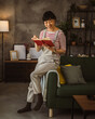 © Miljan Živković - one female mature japanese woman read book at home