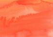 紙の質感のある鮮やかなオレンジの水彩の背景素材