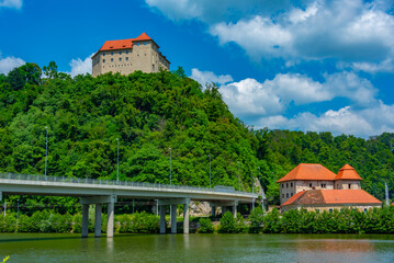 Canvas Print - Rajhenburg castle overlooking Brestanica village and Sava river in Slovenia