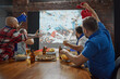 © master1305 - Men emotionally online football match broadcast on TV, cheering for their team while enjoying beer and snacks in good company. Concept of sport, championship, game, sport fans, leisure
