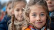 children of luxembourg, A joyful young girl with sparkling blue eyes stands out in a group of children with a candid smile 