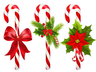 Assorted Christmas Candy Canes with Red Bows and Holly Berry Decorations Isolated on White Background