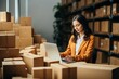 © Dash - Businesswoman Managing Inventory in Warehouse Setting