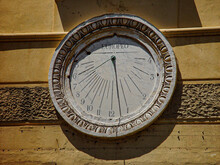 Sundial Clock On The Wall