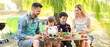 © Pixel-Shot - Happy family having picnic on summer day