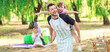 © Pixel-Shot - Little girl with her father having fun in park on summer day