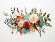 Festive flowers arranged on white wooden backdrop, captured from overhead
