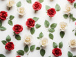 A floral pattern featuring red and beige roses and green leaves is displayed on a white background