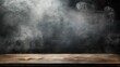 On a black background, an empty wooden table with smoke floats up. Empty space for displaying your products,