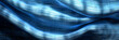 Close up shot of a blue color cloth, texture visible, bright, looks like waves.