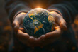 © Pavitra - Close up hand of man holding warming earth due to climate change in the world.
