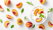 Fresh peaches and cream in a bowl with mint leaves, arranged on a white background.