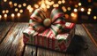 A close-up of a beautifully wrapped Christmas gift with a large, intricate bow on a wooden surface, with softly blurred lights in the background.