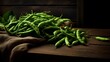 Green peas peeled and in pods on a wooden background. Vintage napkin. Wooden table.