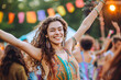 Happy woman dancing at colorful festival
