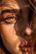 close-up on young woman face with sunlight shining on her