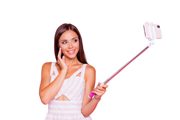 Poster - Pretty beautiful lovely gorgeous attractive lady with brunette hair make selfie on her gadget coquettish posed isolated on vivid pink pastel background in white casual wear