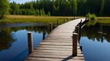 Fototapeta Pomosty - The Wooden Bridge Overlooking the Pristine Lake, A Wooden Bridge Connecting Land and Water in the Forest, Exploring the Calm Waters from the Wooden Bridge, Walking the Wooden Bridge Amidst Nature's