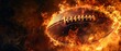 An American football engulfed in flames