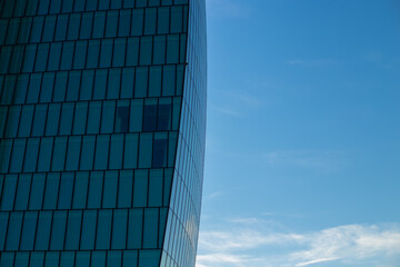 Wall Mural - Skyscraper against the blue sky. Place for text. Glass buildings in Milan, Italy. CityLife Shopping District complex - the new commercial and residential area. Finance, economics, future concepts