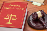 Fototapeta Nowy Jork - A law book with a gavel - Administrative law in spanish